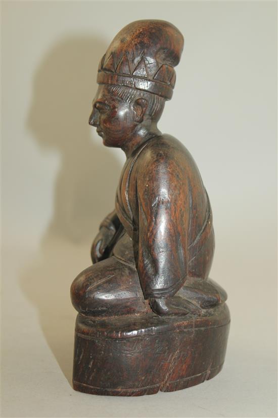 A Chinese Jichimu seated figure of a monk, 19th century, 8cm